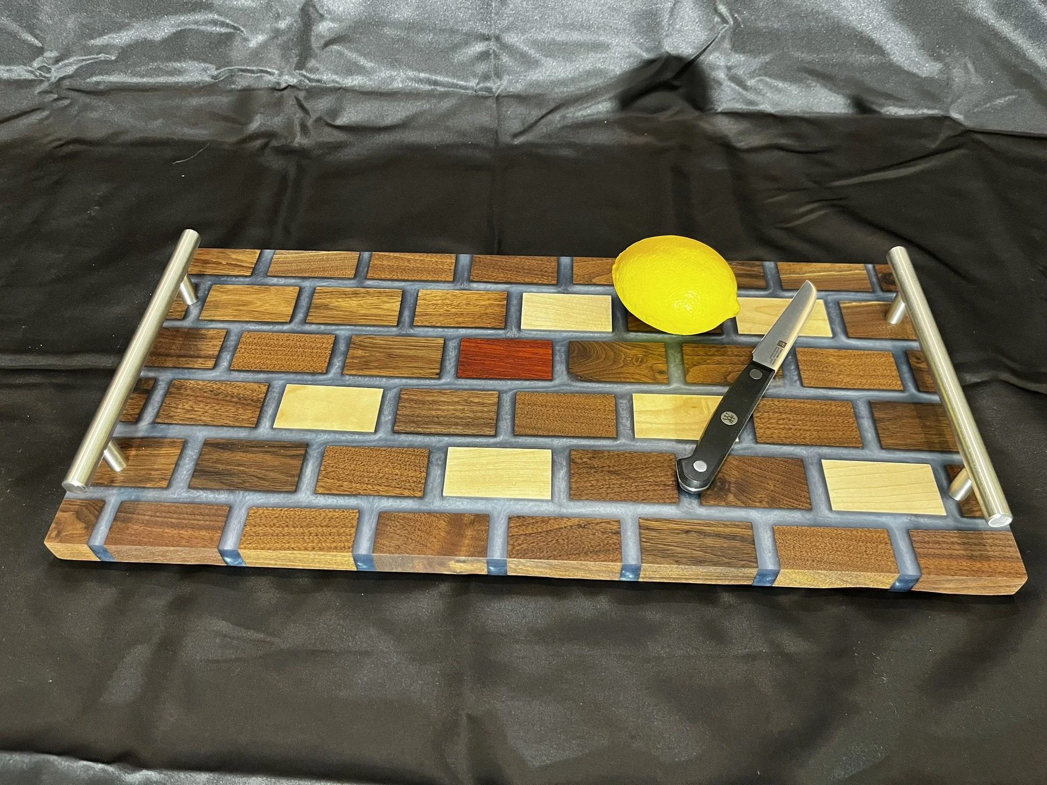 Random padouk block mixed in with walnut and maple.