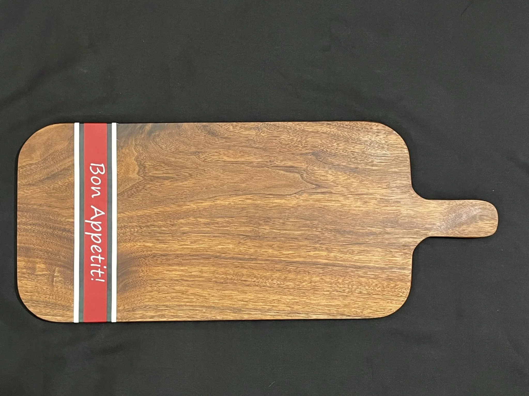 Walnut paddle board with epoxy inlay.