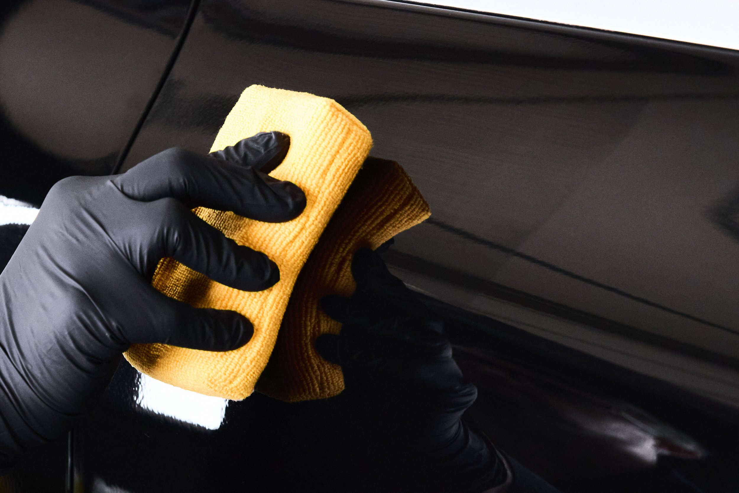 Ceramic coating application using applicator pad during final protection stage