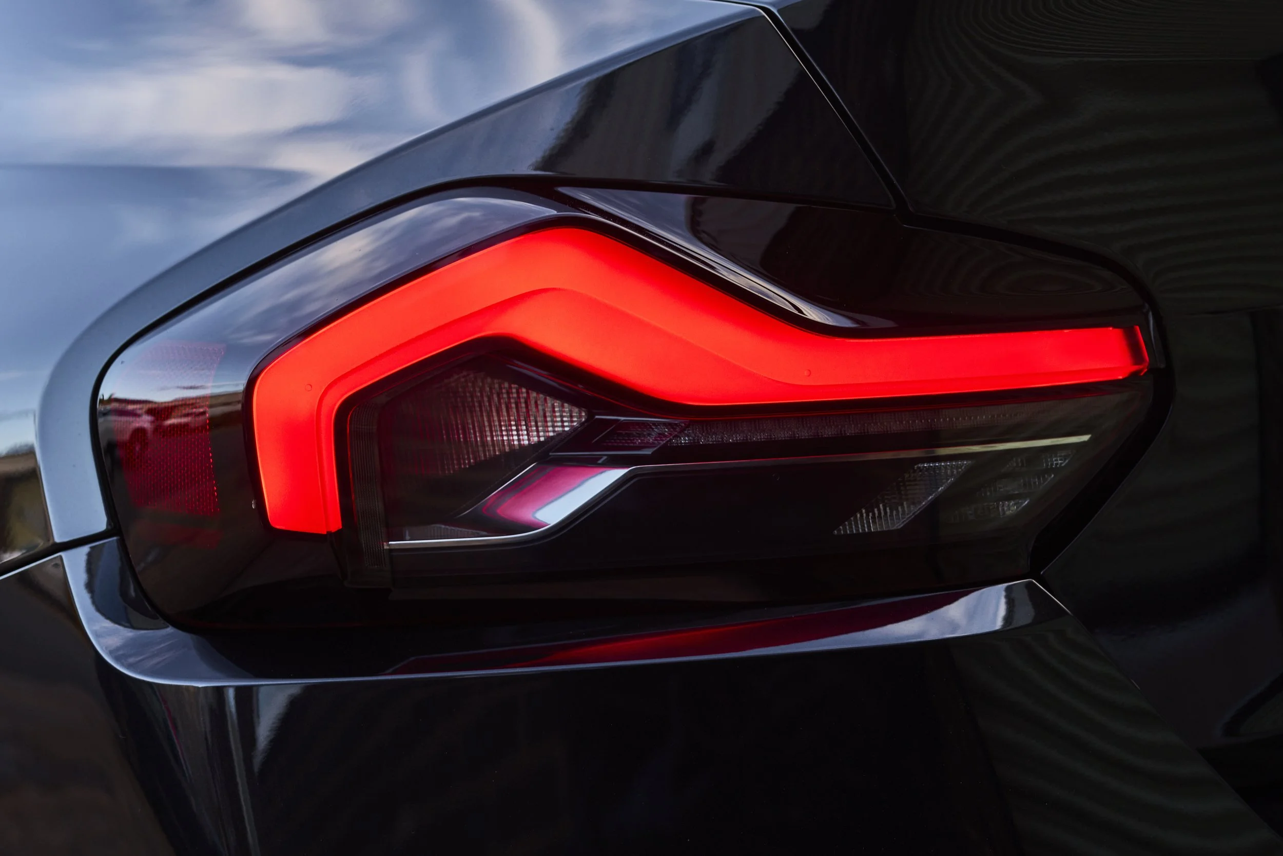 BMW 230i rear light and paintwork detail showing gloss and clarity after polishing