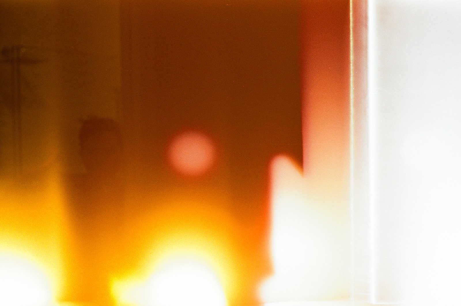 Close-up of colorful abstract lights with warm tones and soft focus.