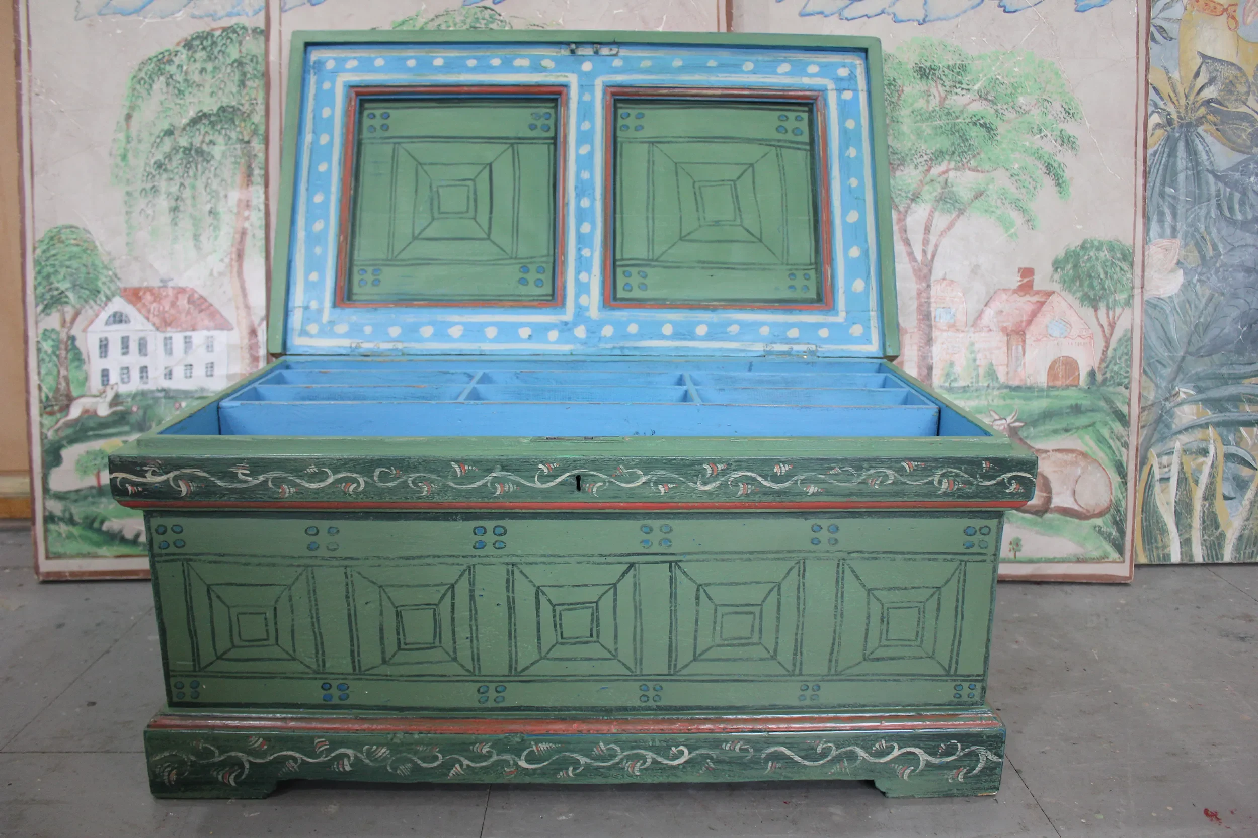 Hand-painted decorative chest by Melissa White, made for Kit Kemp's Drawing Room installation at Bergdorf Goodman, New York, 2019. Chest is open, revealing hand-painted interior in a contrasting blue.