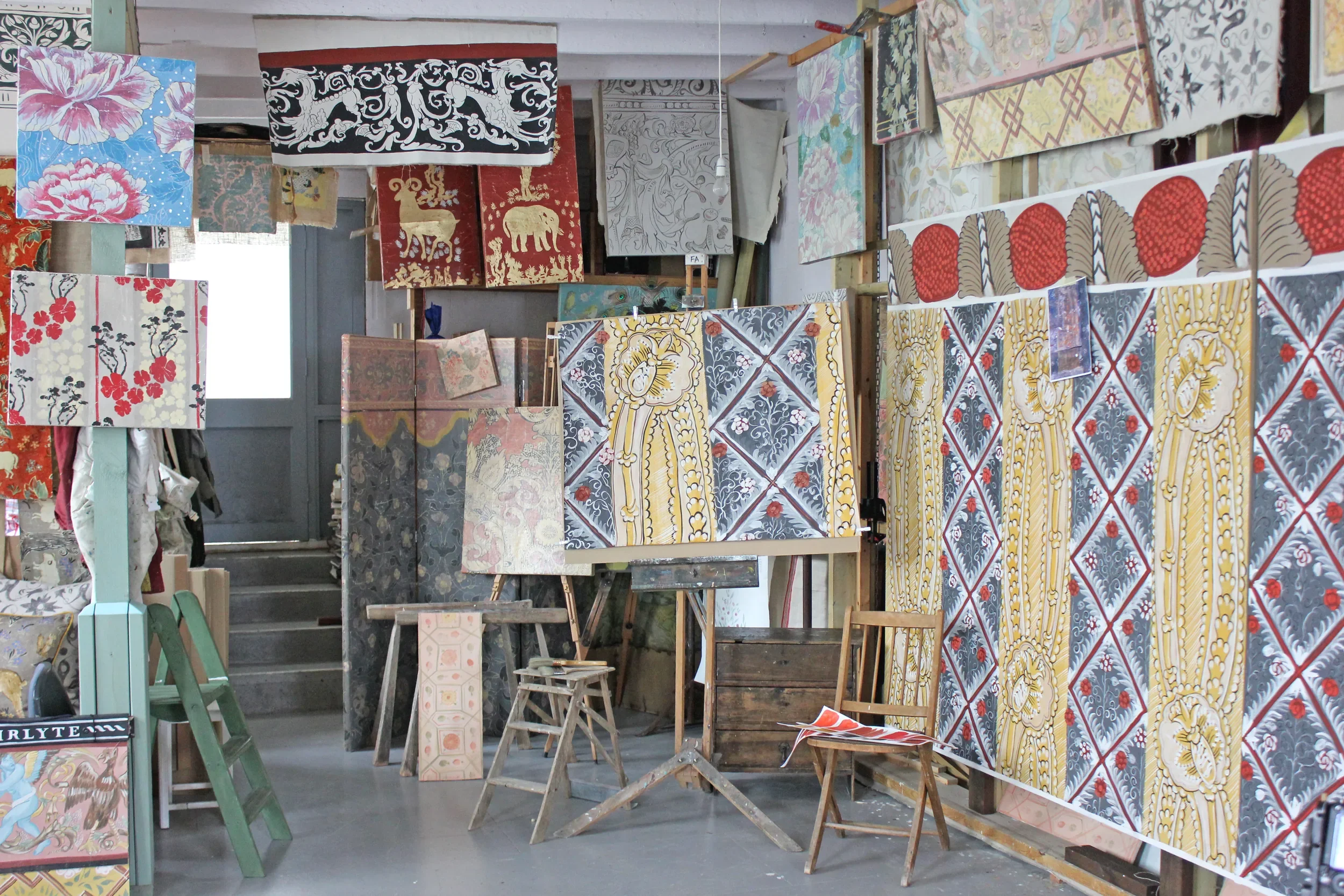 Melissa White's Hastings studio with fabric and wallpaper samples on display. Pictured prominently is the Bayleaf panel.