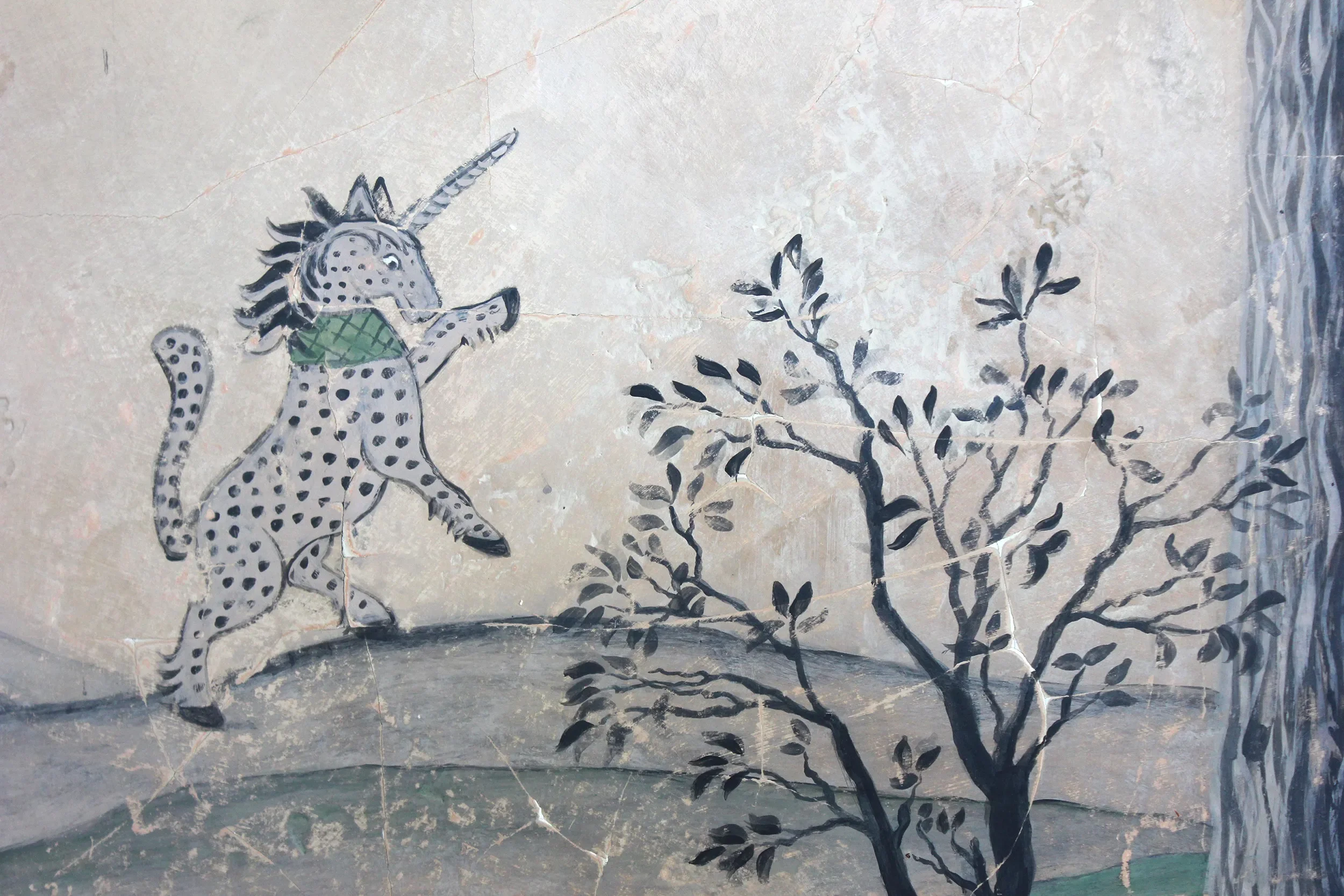 A stylised mythical creature - a sort of zebra-cum-unicorn - is pictured. It is a detail from Melissa White's Mythical Land wallpaper for Kit Kemp and Andrew Martin.