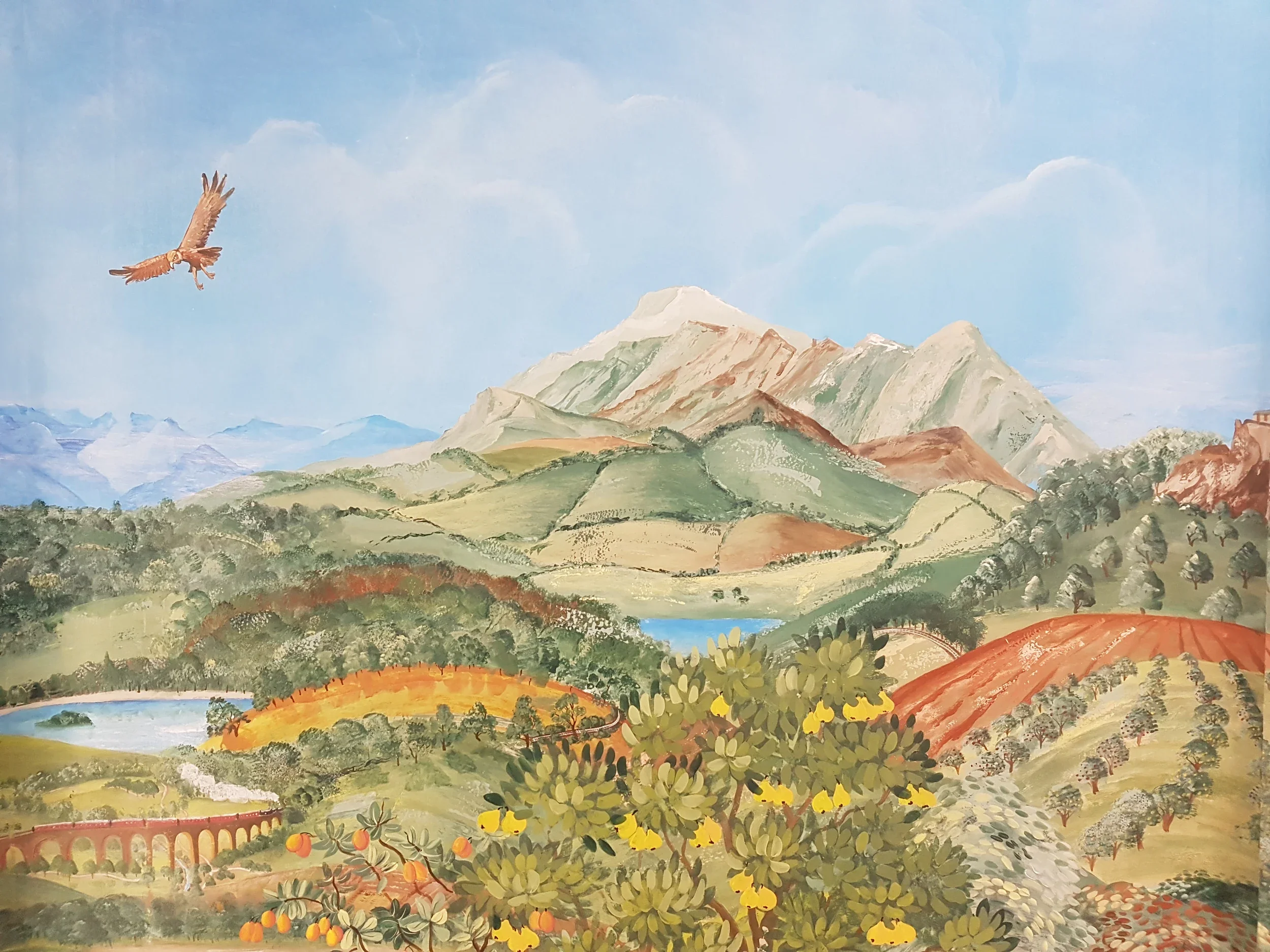 A painting of rolling hills, mountain peaks, trees, a lake, and a blue sky with clouds, with a bird flying in the sky.