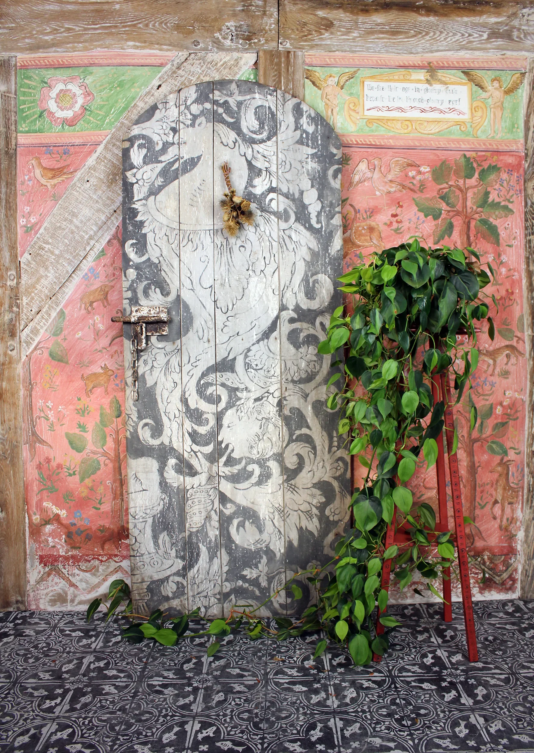 A Tudor-inspired hand-painted door by Melissa White, developed when she was Annie Sloan Painter in Residence and now for sale in the Atelier.