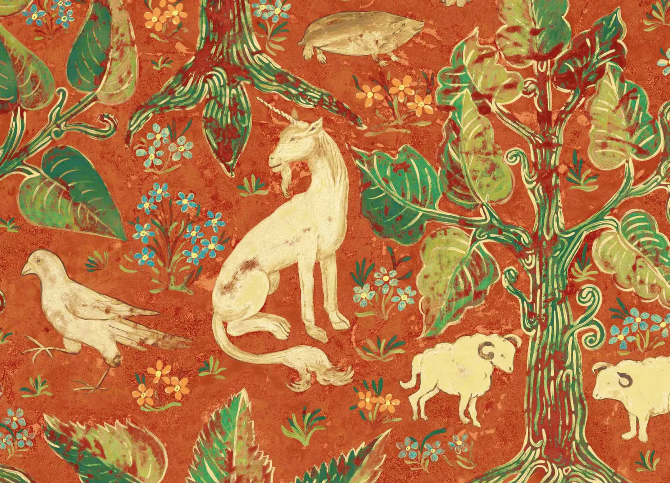 A traditional textile with a red background featuring illustrations of animals such as a lion, an elephant, and a bird, surrounded by green leaves and small blue and orange flowers.