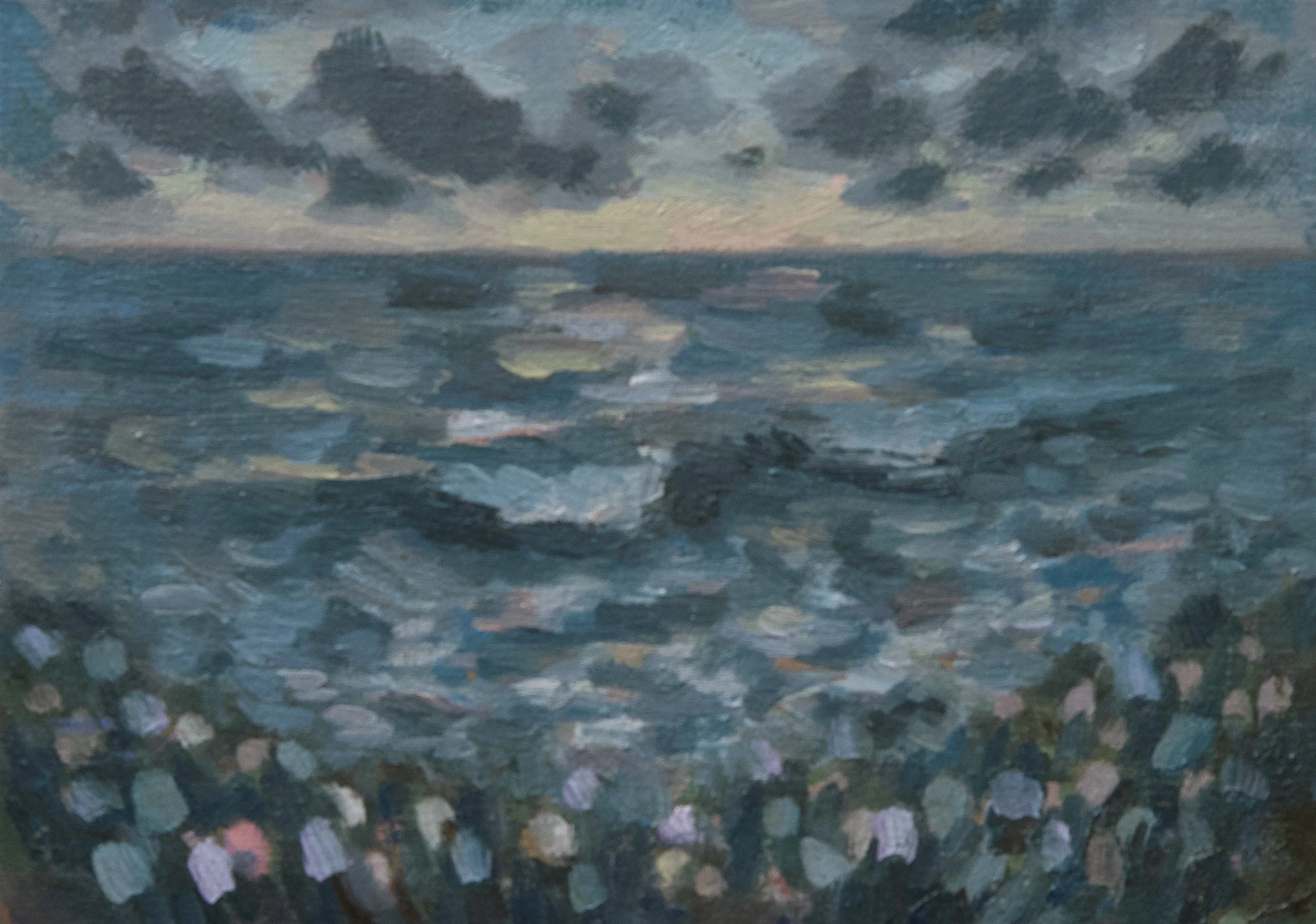 A painting of a cloudy sunset over a body ocean waves, with reflected colors of the sky and native flowers in the foreground.