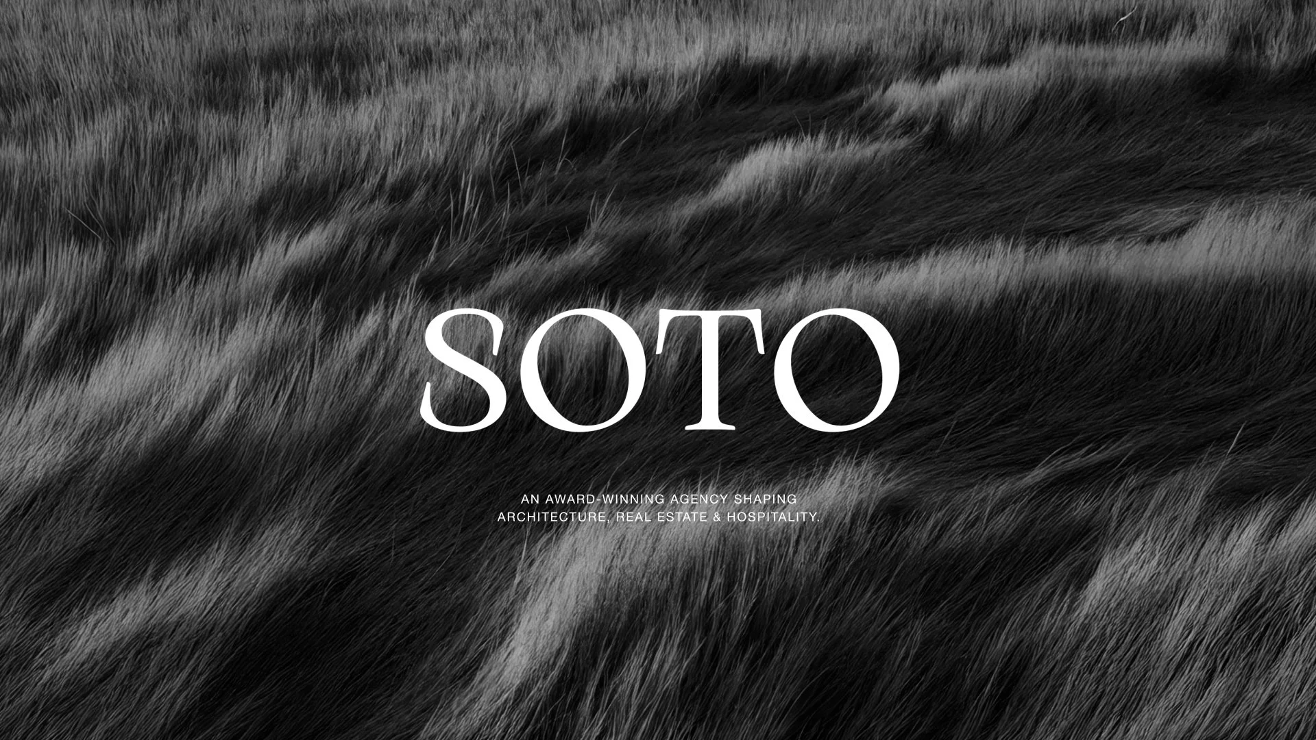 A black and white close-up photograph of fur with the text 'SOTO' and a tagline about architecture, real estate, and hospitality.