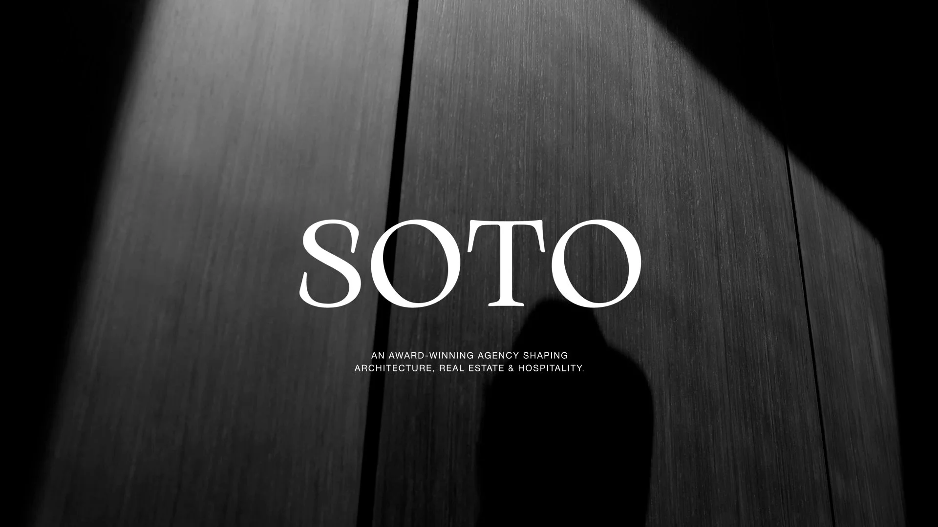Black background with the word 'SOTO' in large white letters. Small white text beneath reads 'An award-winning agency shaping architecture, real estate & hospitality'.