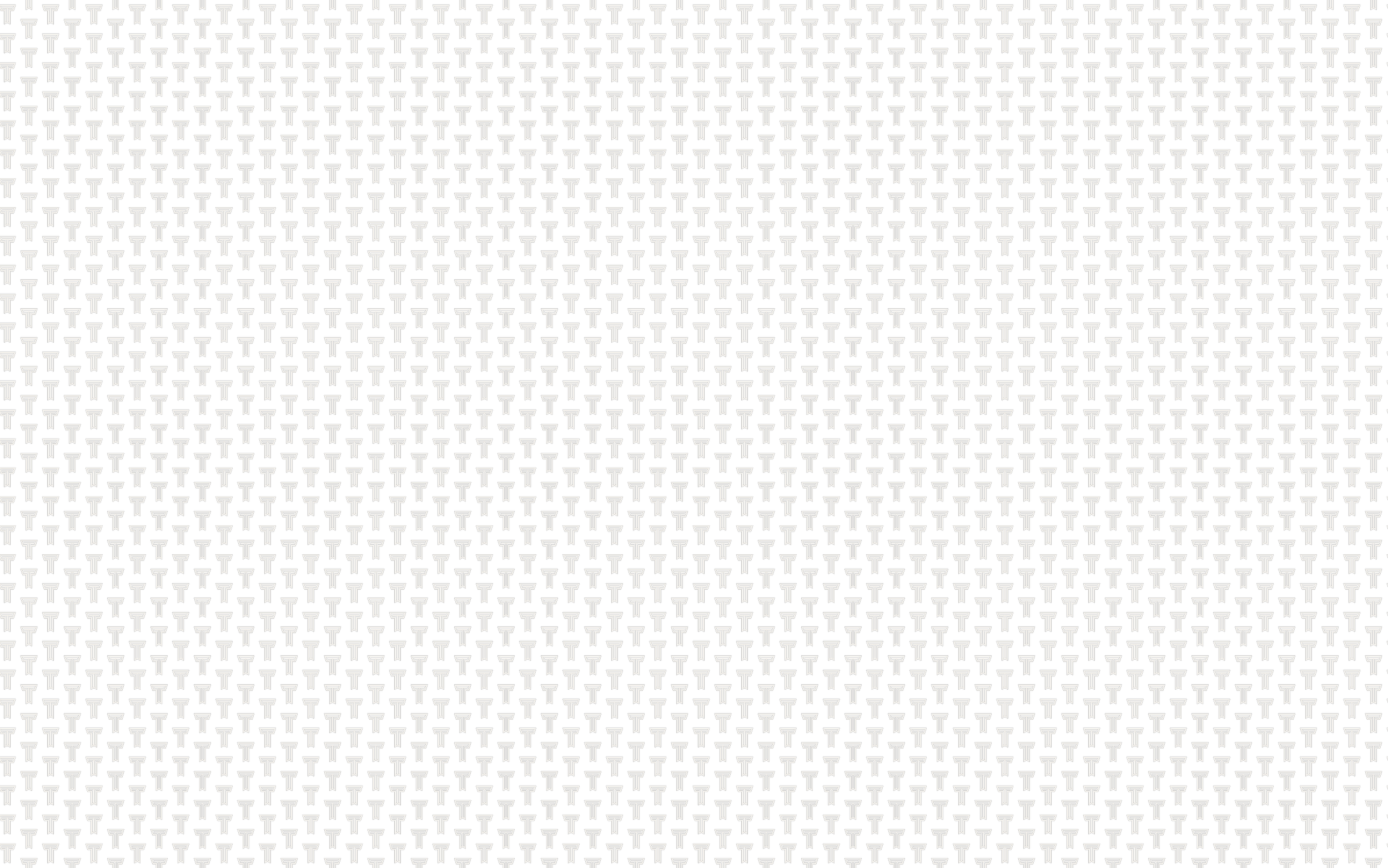 Black background with repeating white graduation cap icons.