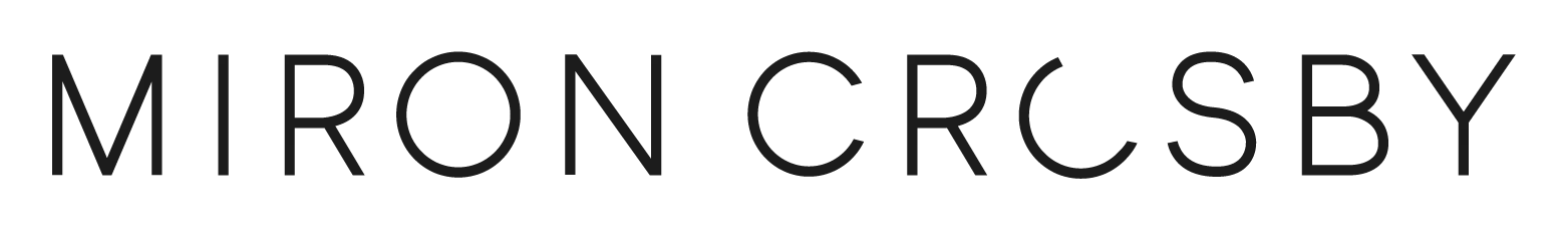 Pixelated black text on white background that reads 'MIRON CRCXBY'.
