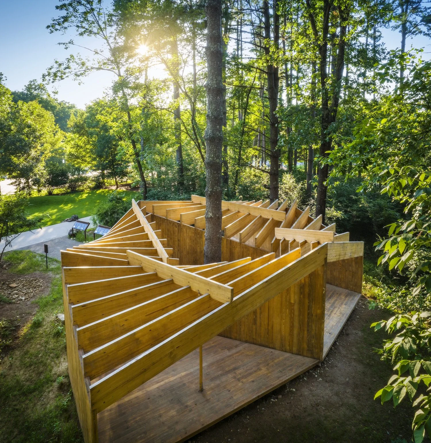 glue laminated wood beams compose a sculptural architecture follie for a museum outdoor exhibition. designed by Levenbetts and curated by Dylan Turk