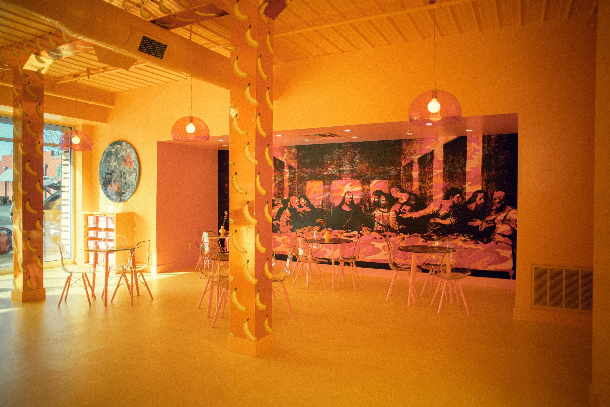 bold sweet shop hospitality space designed by Dylan Turk. Flavor Paper Andy Warhol wallpaper serves as the anchor in this magically contemporary space.