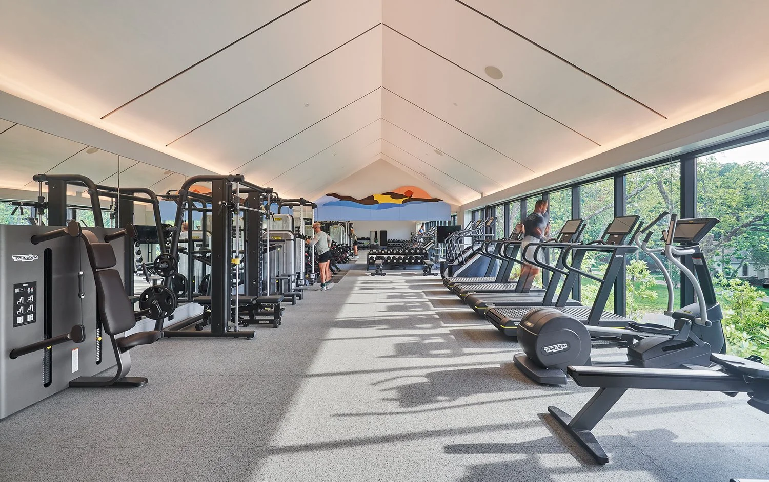 Kenesha Sneed commissioned mural hangs in the gym at the private arts and wellness focused members club. Curated by Dylan Turk.