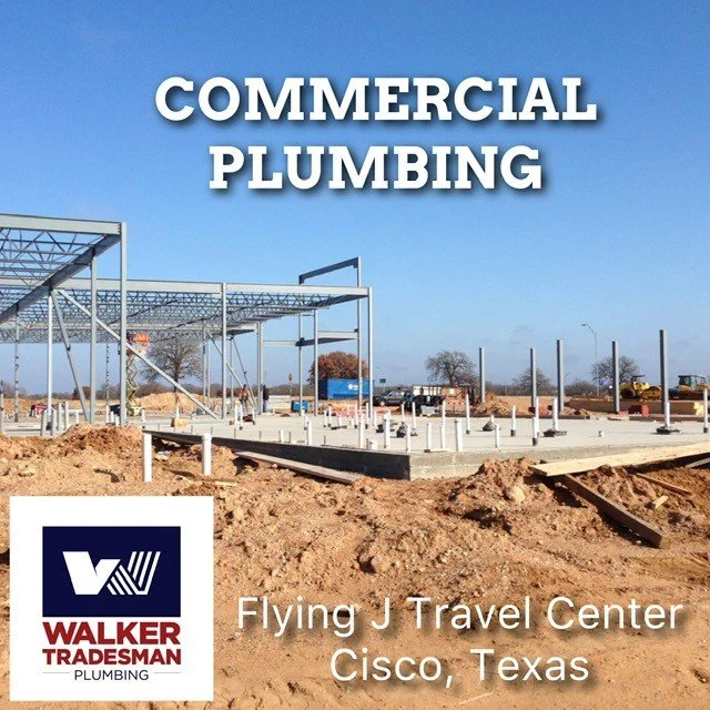 Construction site with steel framework and concrete foundation, signage indicating commercial plumbing for Flying J Travel Center in Cisco, Texas.