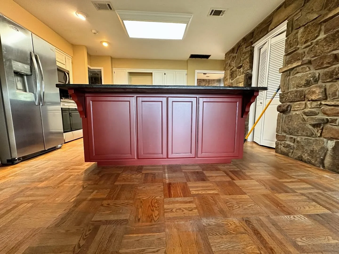 Check out this kitchen island!! Gotta love that maroon