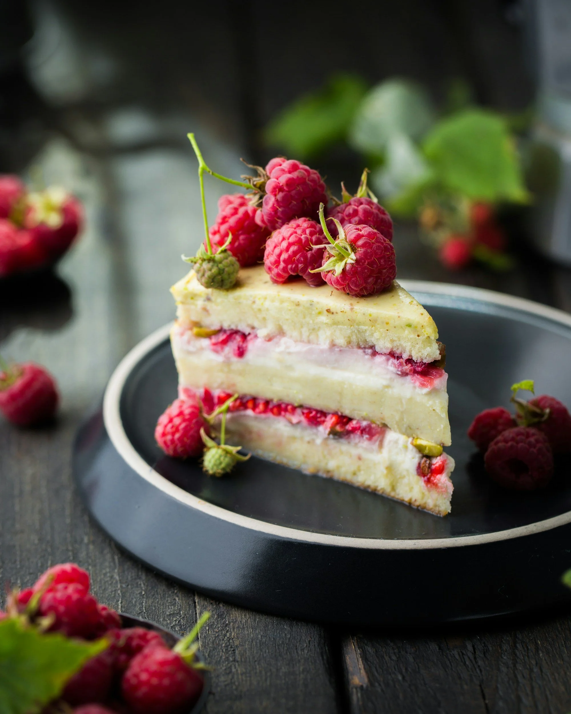 Our Alaskan wilderness lodge features exceptional dining options for all courses, including desserts like this sponge cake with raspberries and mint.