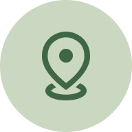 Map location pin icon on a green circular background