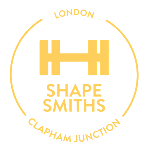 Logo for ShapeSmiths London-based CrossFit and Hyrox gymfeaturing a yellow flattened H shape, with 'London' at the top and 'Clapham Junction' at the bottom, in yellow text, on a white background.