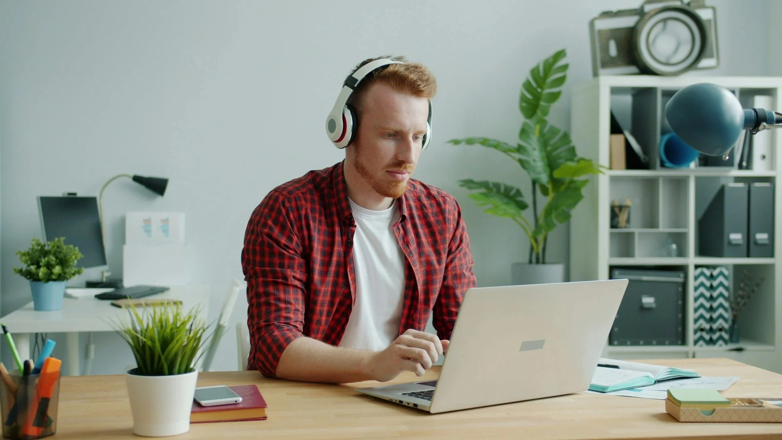 Man doing online therapy on his laptop