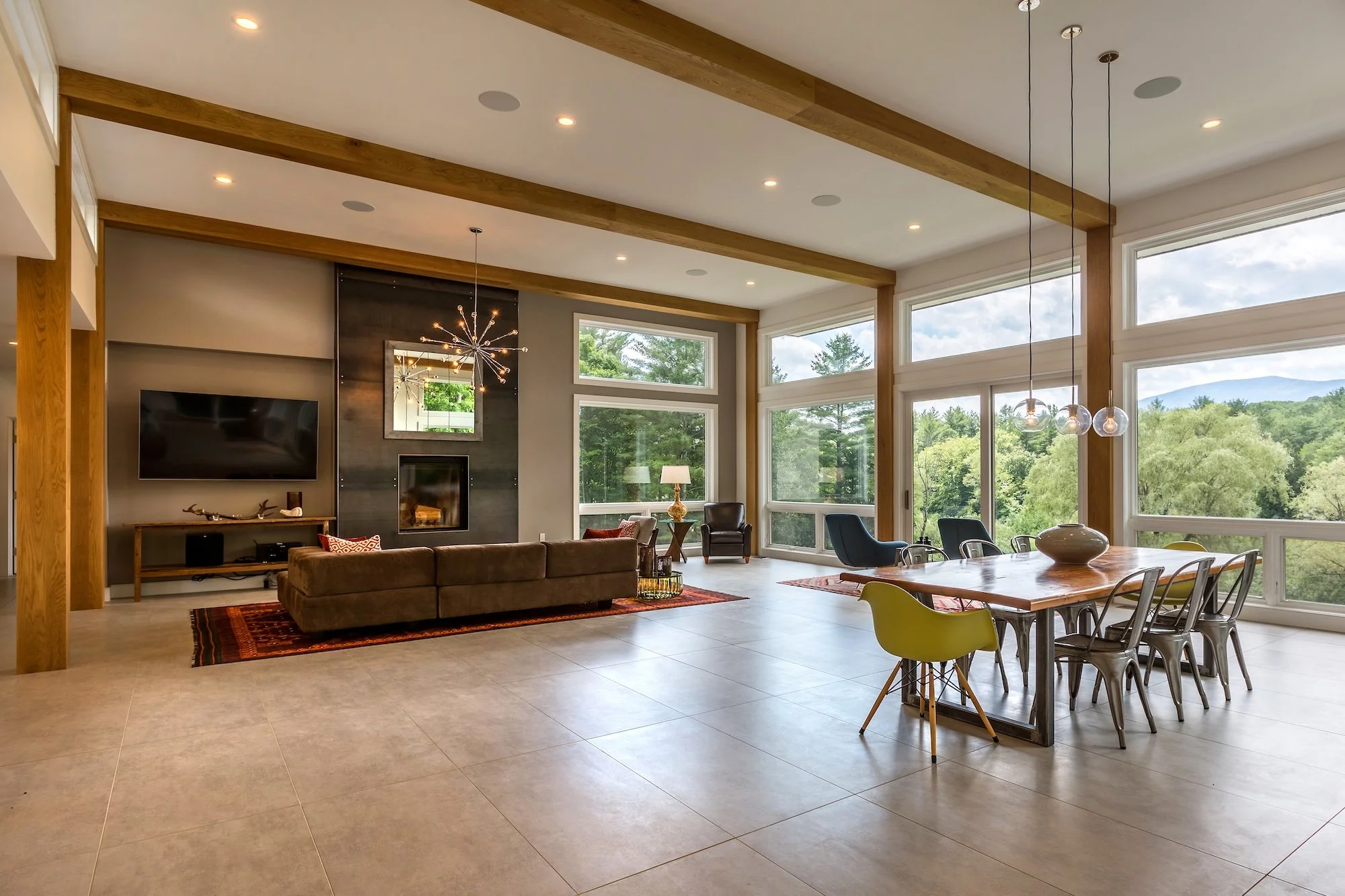 Modern interior living room with fireplace and neutral walls.