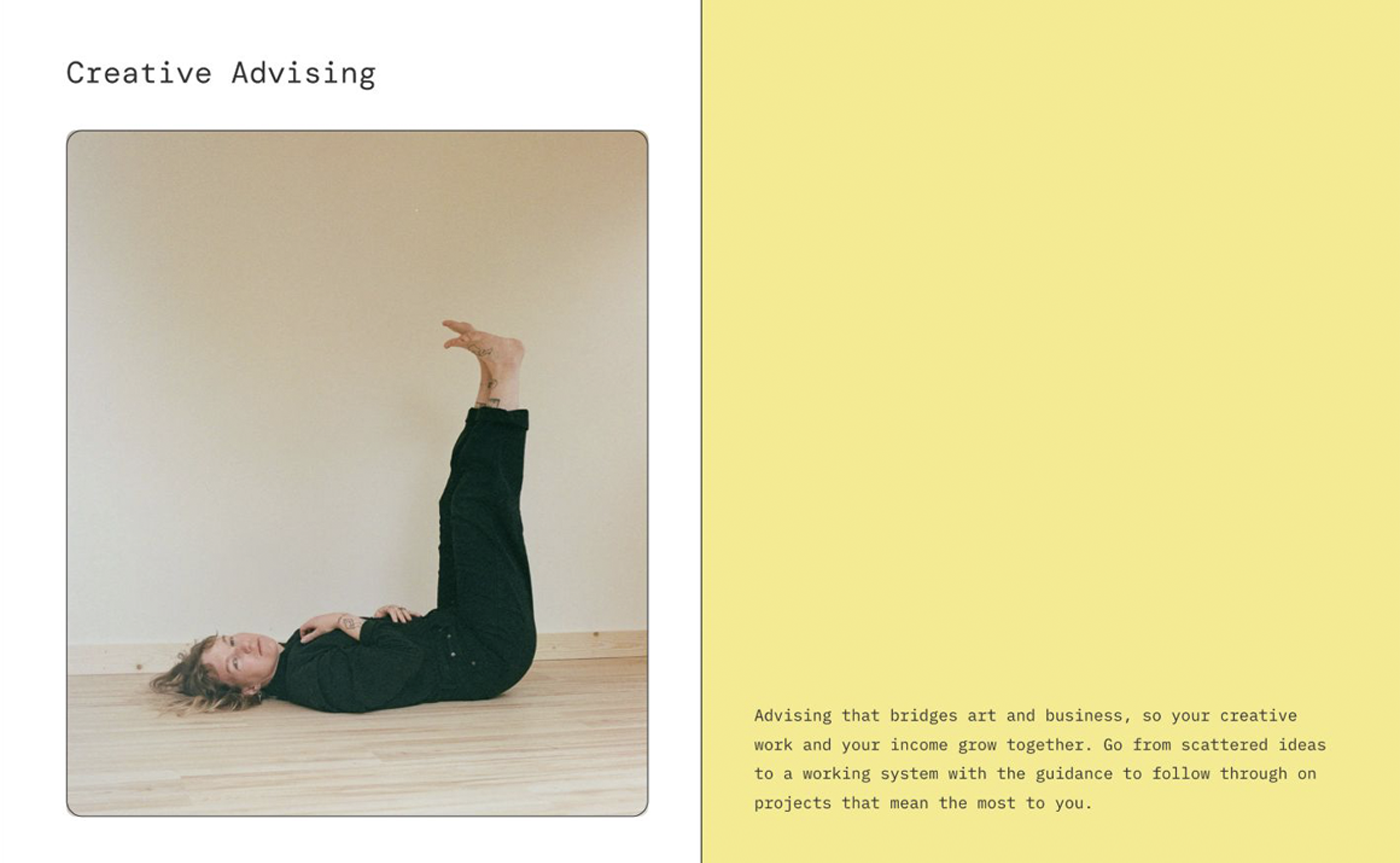 Photo of a person lying on the floor with their legs raised vertically, smiling and looking at the camera. The left side has the heading "Creative Advising," and the right side has a yellow background with black text about bridging art and business.