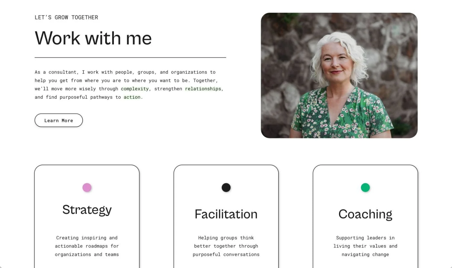 A webpage featuring a photo of an older woman with white curly hair wearing a green floral dress, smiling outdoors with a rocky background. The page heading reads "Work with me" and describes consulting services including strategy, facilitation, and coaching.
