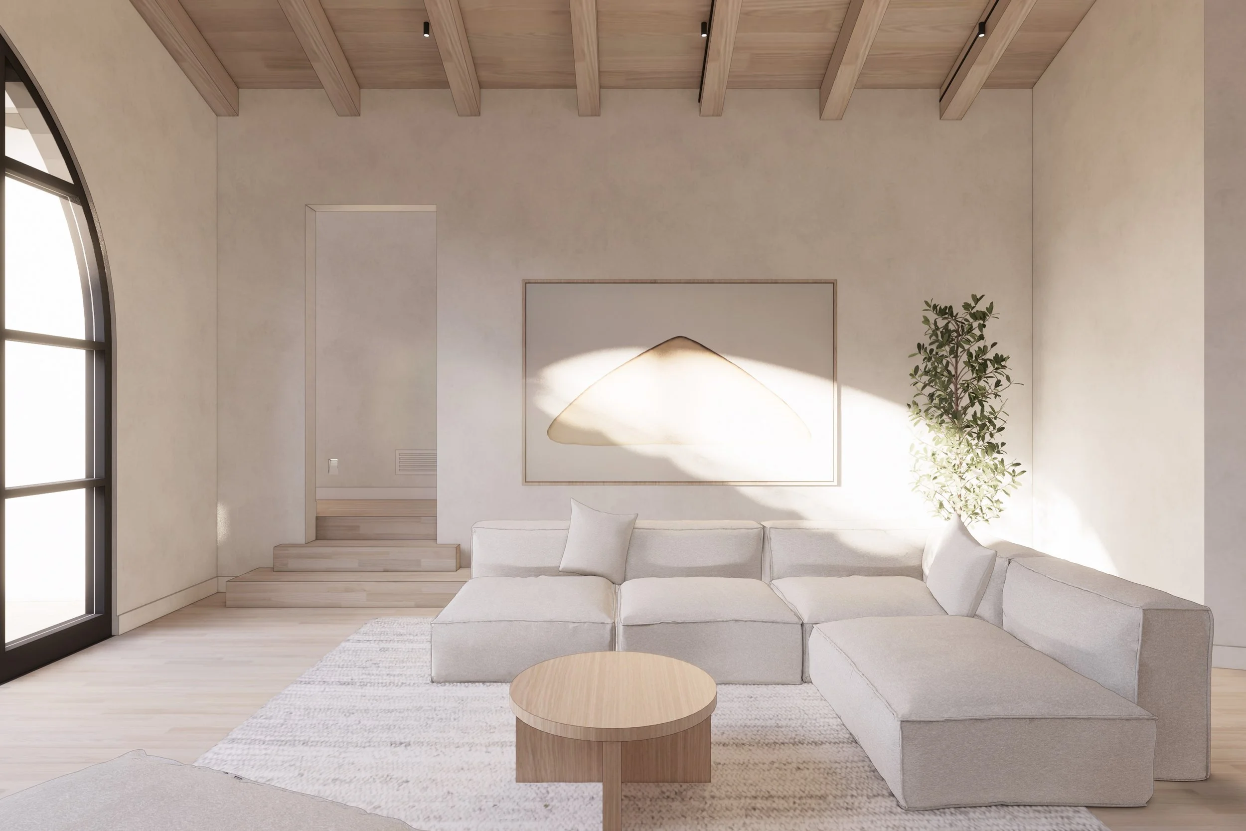 A minimalist living room with a white sectional sofa, a round wooden coffee table, a potted plant, and a large abstract artwork on the wall, illuminated by natural sunlight.