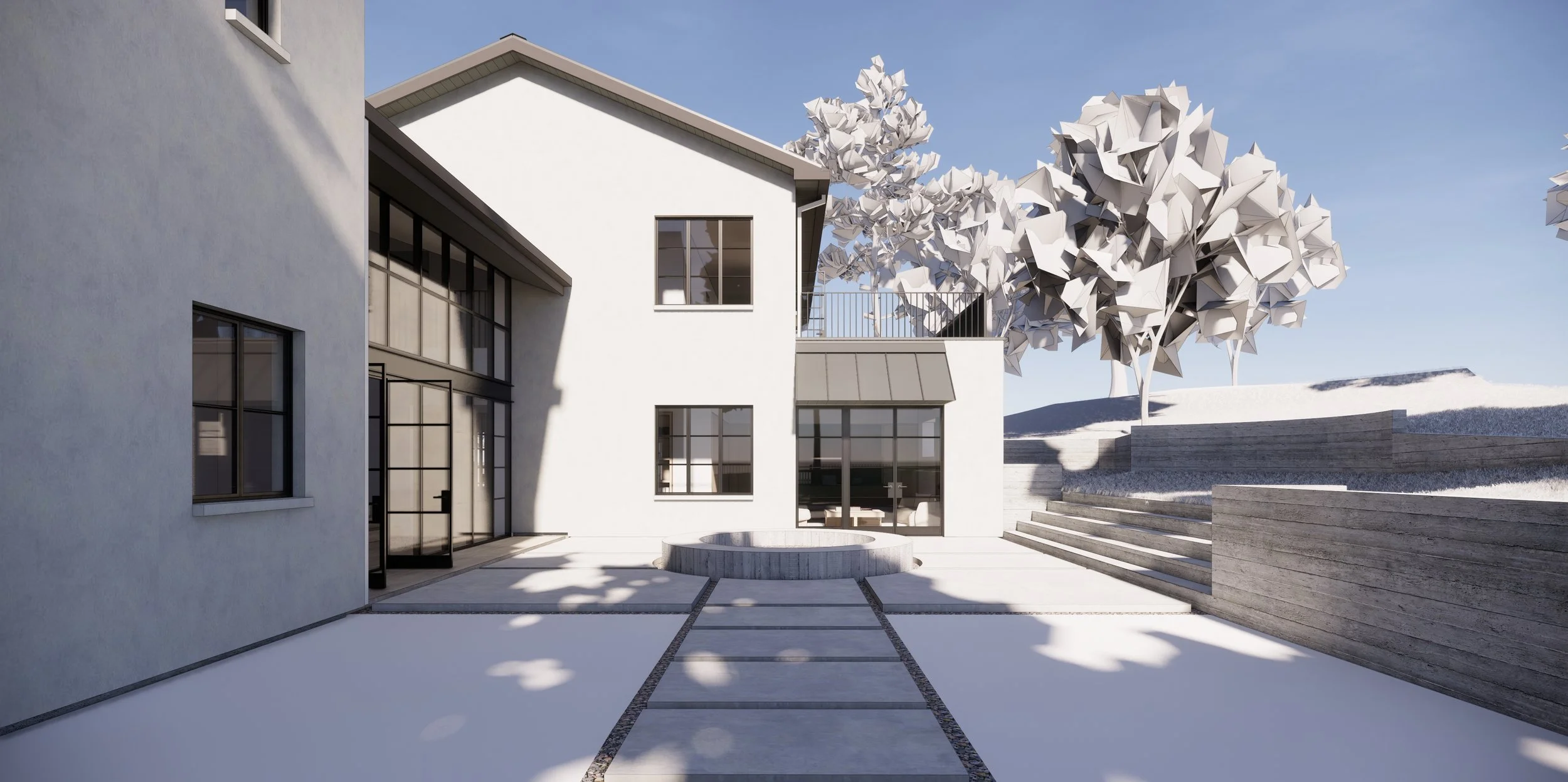 Modern white residential house with large glass windows and balcony, surrounded by a paved yard with trees and steps, under a clear blue sky.