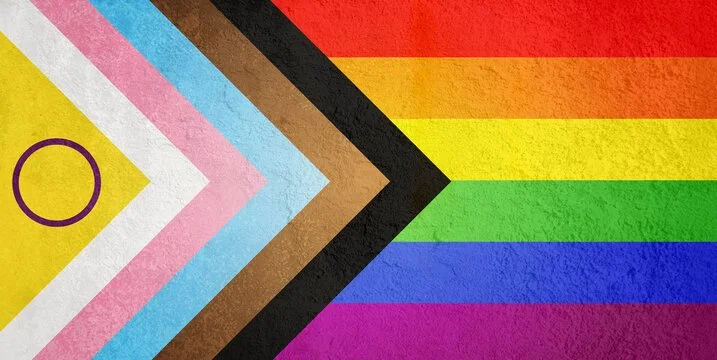 A colorful pride flag with rainbow stripes on the right, and geometric patterns with multiple colors on the left.