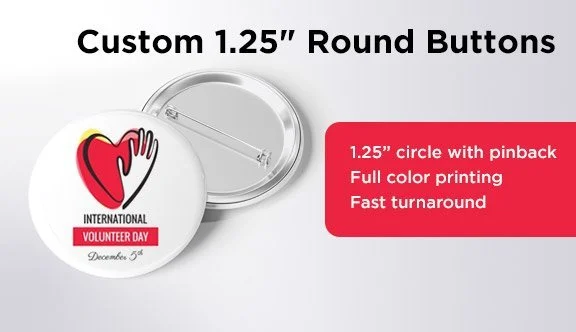 Button with a heart logo and text for international volunteer day, with information about custom 1.25-inch round buttons, including full color printing and fast turnaround.
