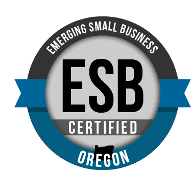 ESB Certified badge for emerging small business in Oregon, featuring a black and gray circle with blue accents.