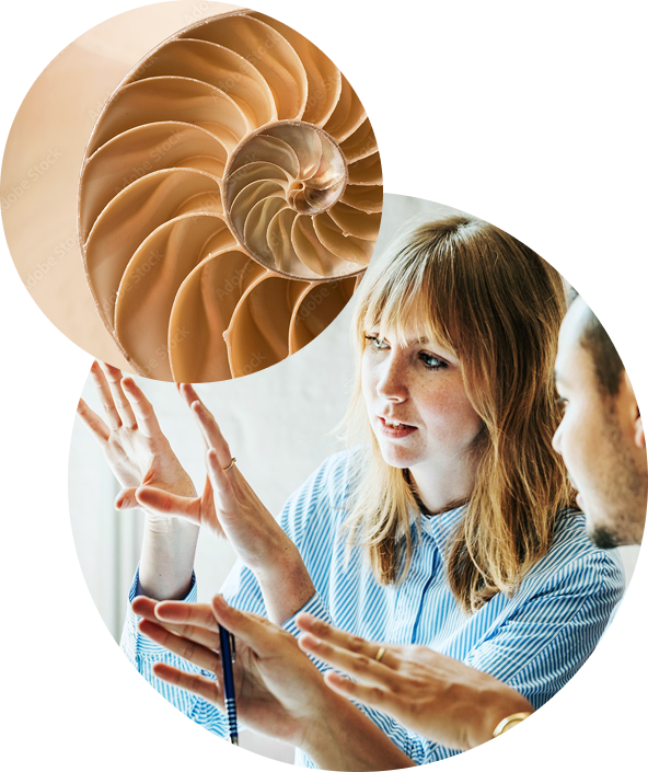A woman explaining while gesturing with her hands, sitting across from a man, with a large spiral seashell overlay in the top left corner.