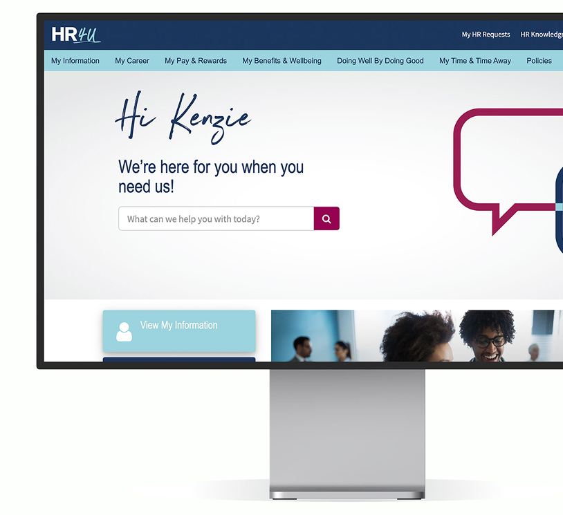 HR4U dashboard on a monitor with blue navigation bar at the top. “Hi Kenzie” welcome message and search bar centered on a white background.