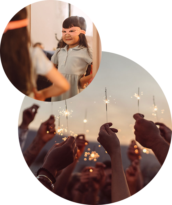2 overlapping circle images containing a young child in a super hero pose and the other of a group of hands holding sparkers at sunset.
