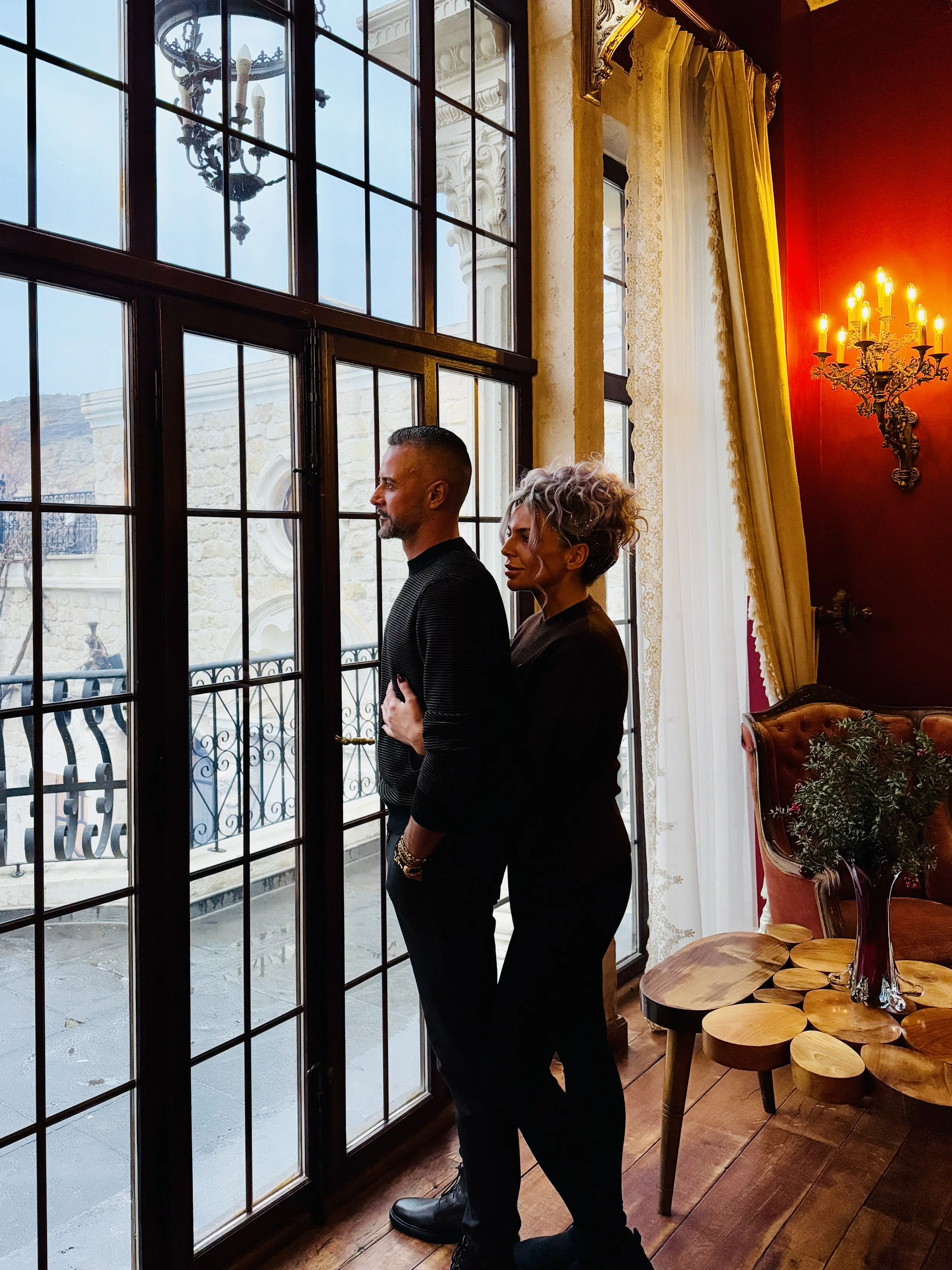 Couple enjoying a refined interior during a bespoke luxury travel experience