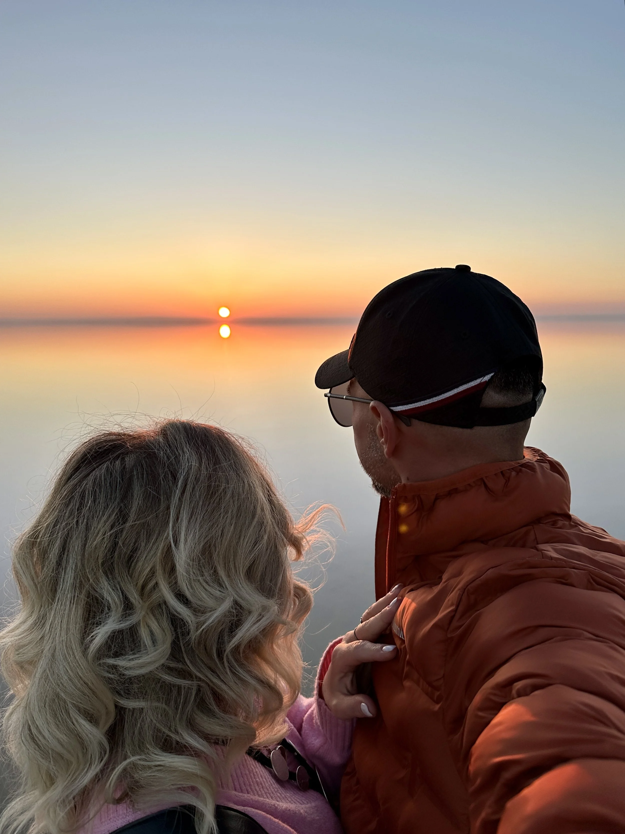Couple enjoying a private sunset during a bespoke luxury travel experience at Salt Lake