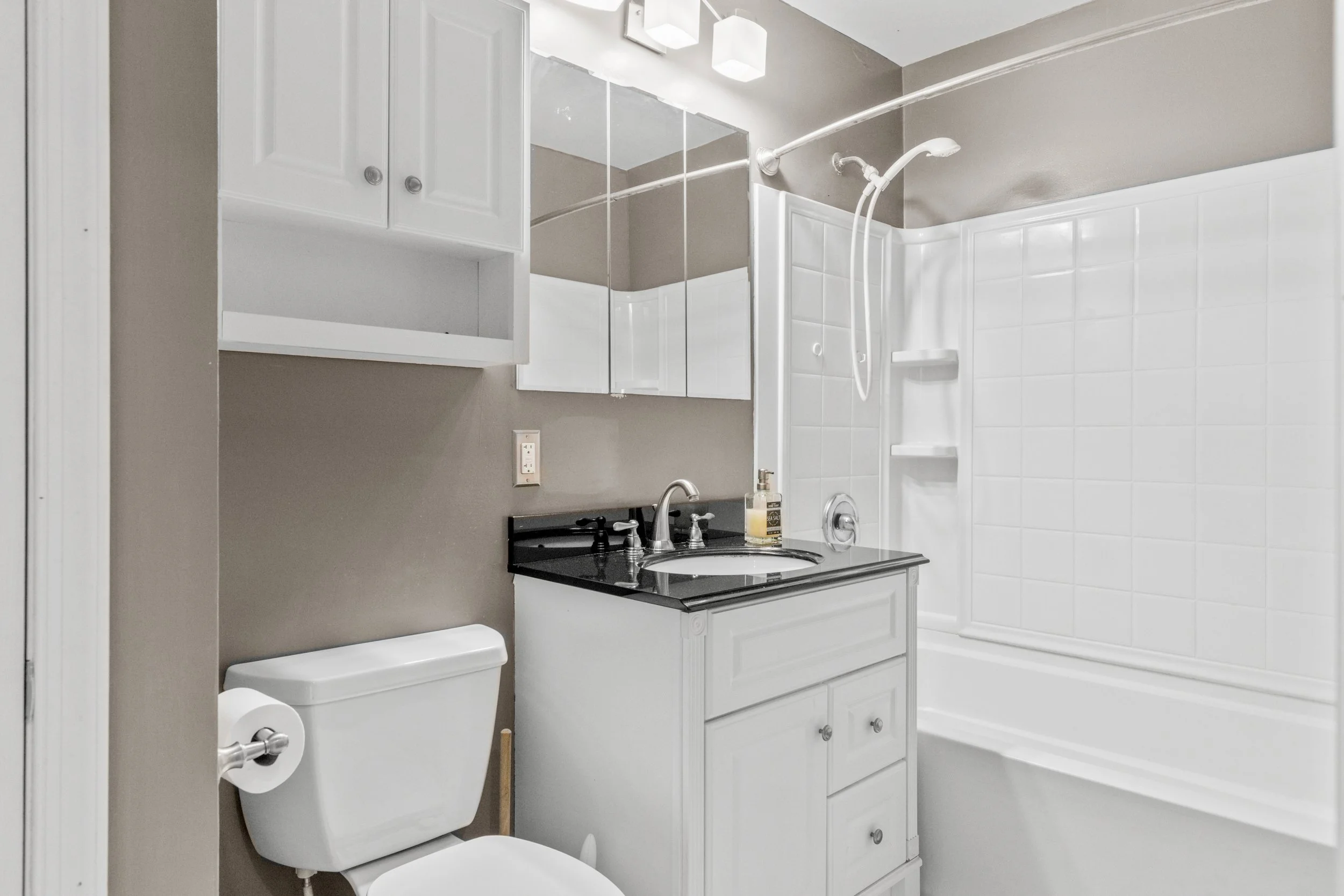 Bathroom with white tiles,  283 Mariners Way, Copiague NY