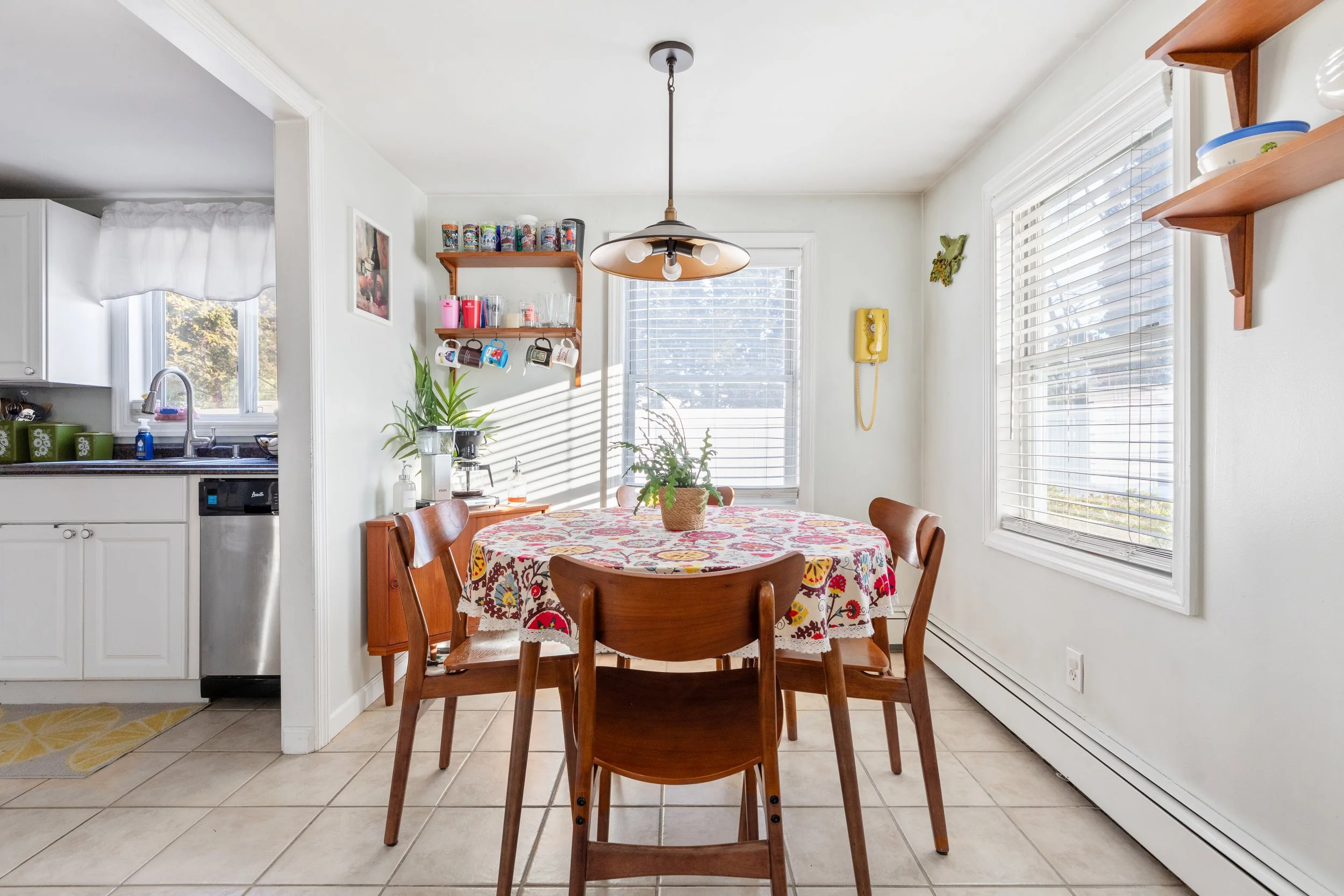 kitchen with natural light and antique light fixture, 46 Rowland St. Patchogue, NY