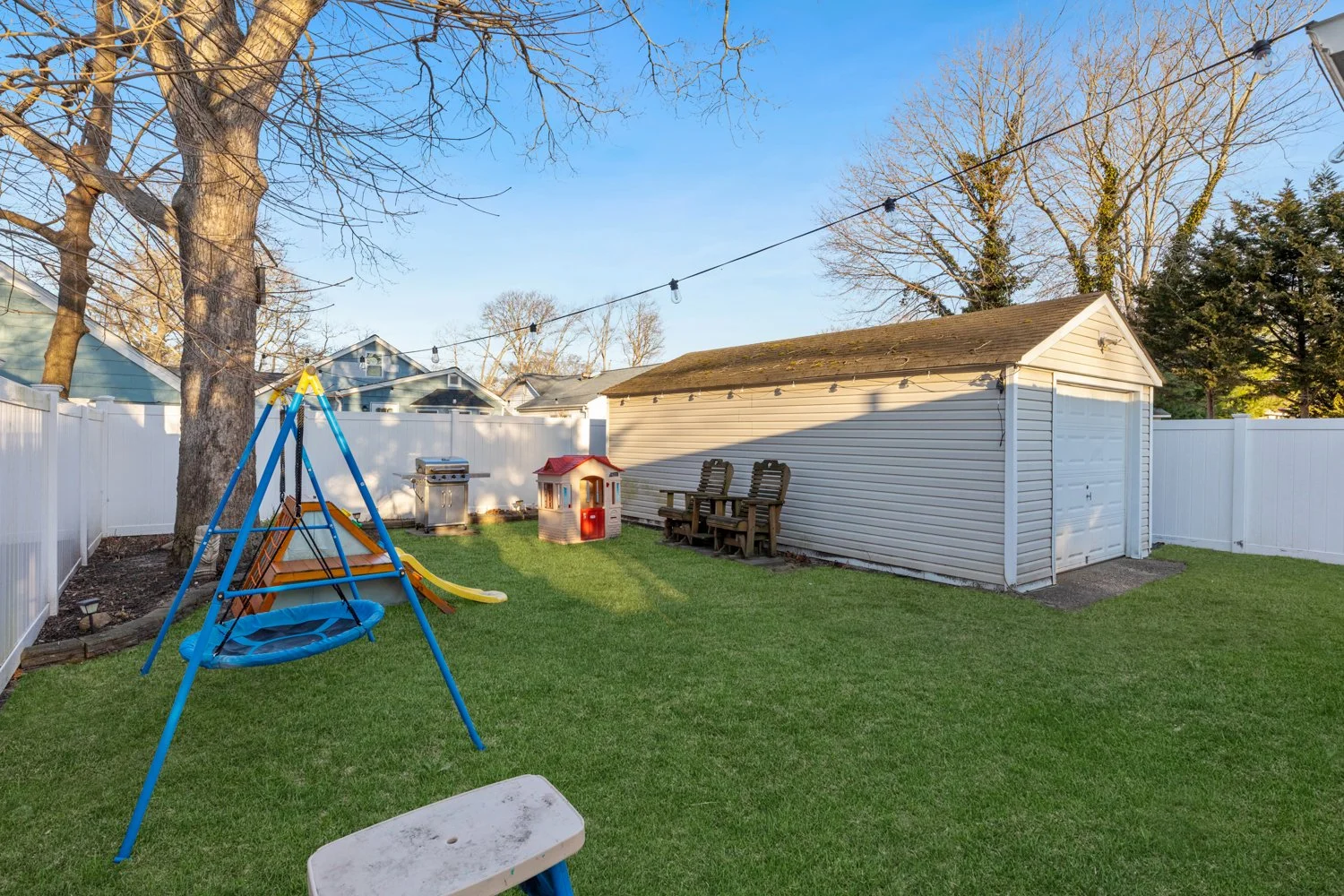 backyard with garage and new fencing 46 Rowland St. Patchogue, NY