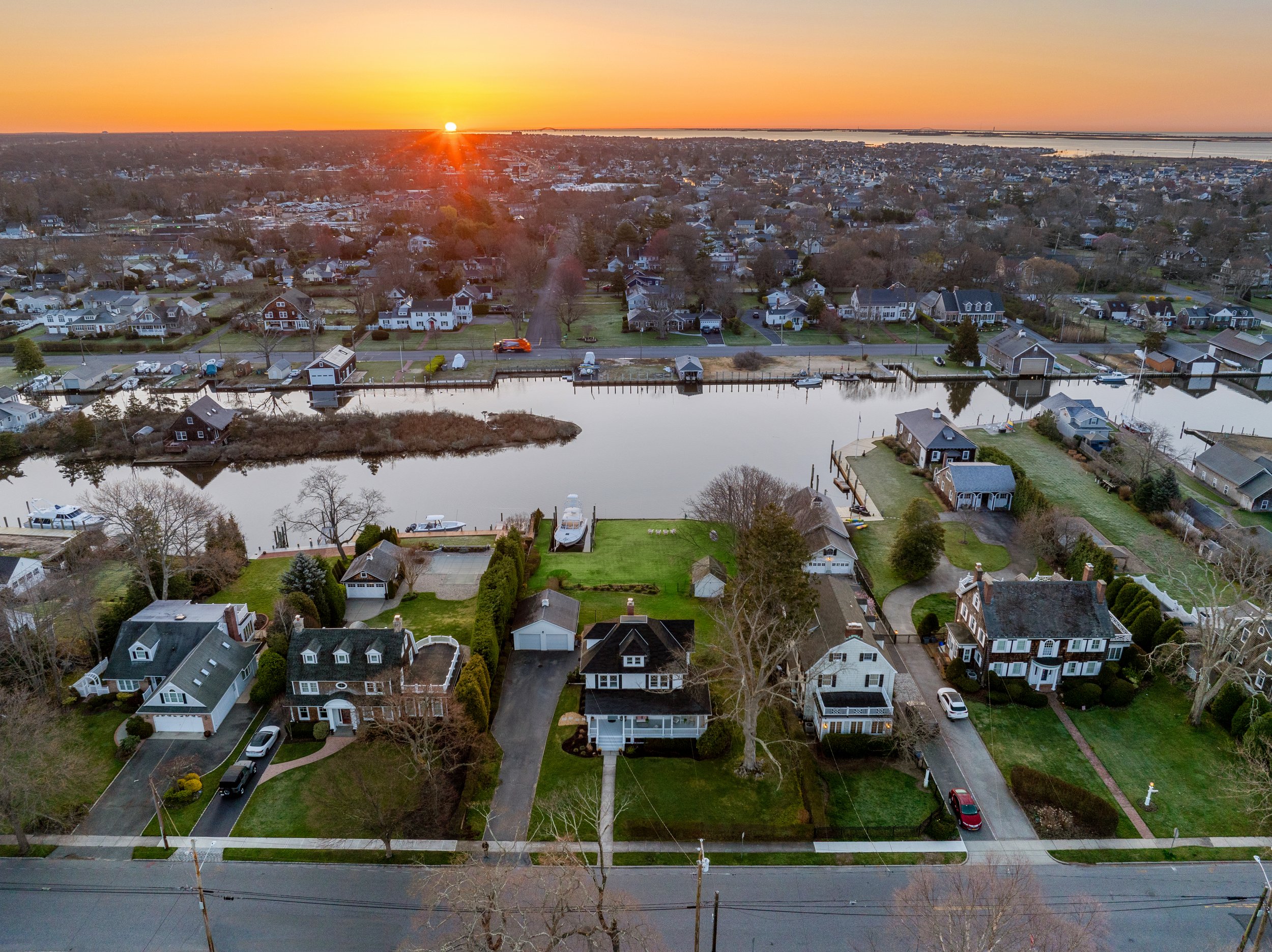 Waterfront home at sunrise in Amityville, New York
