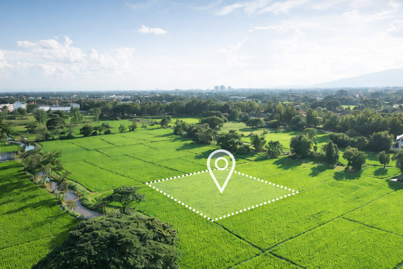 Aerial view of open land highlighted for outdoor hospitality development and site planning.
