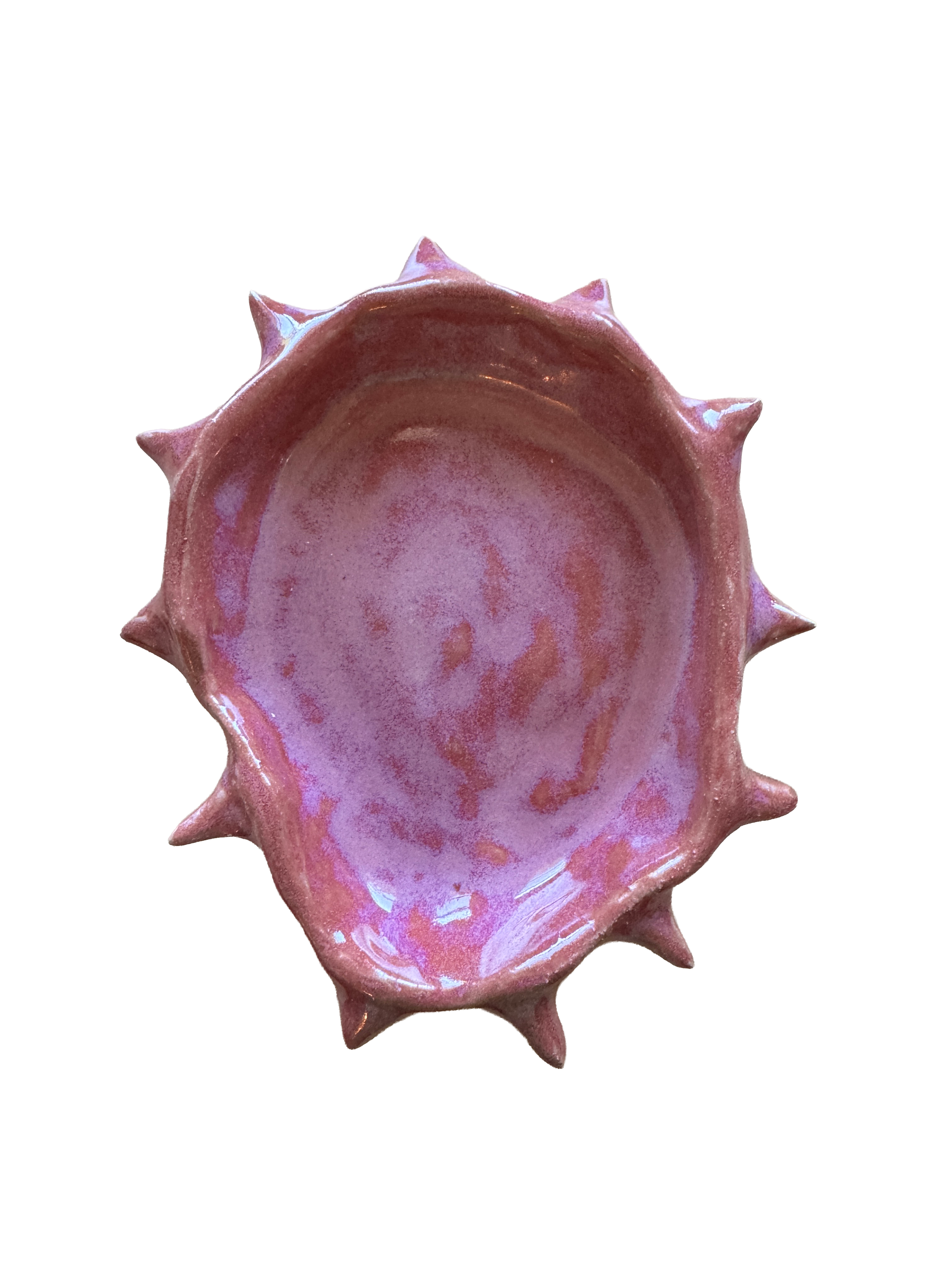 A pink ceramic bowl with a glossy finish, spiked edges, and an inner surface that transitions from pink to a speckled, lighter pink.