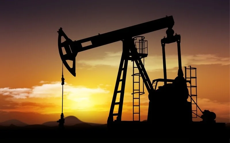 Oil jack in front of a sunset