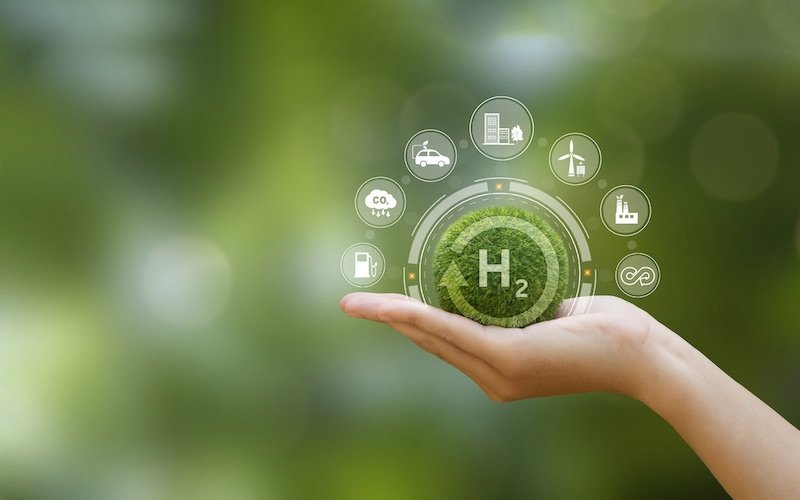 Hand holding an H2 illustration