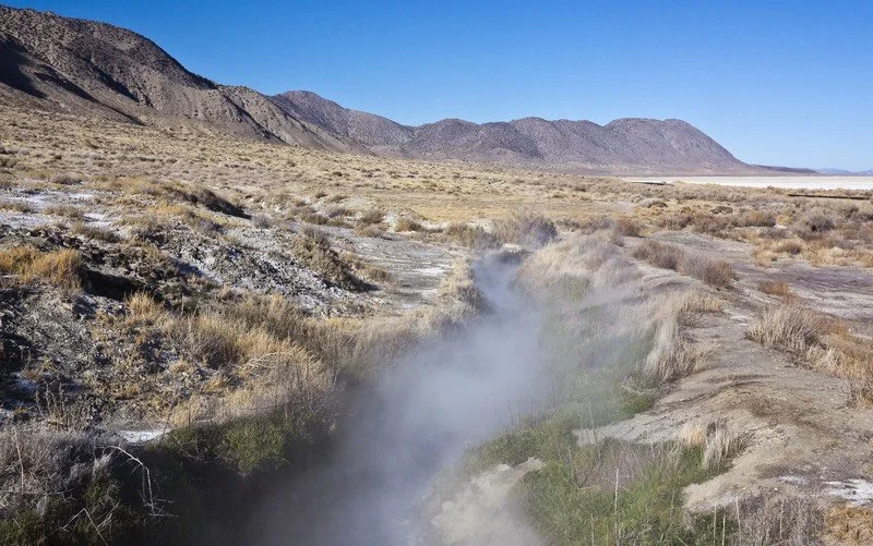 Crack in the earth emitting steam