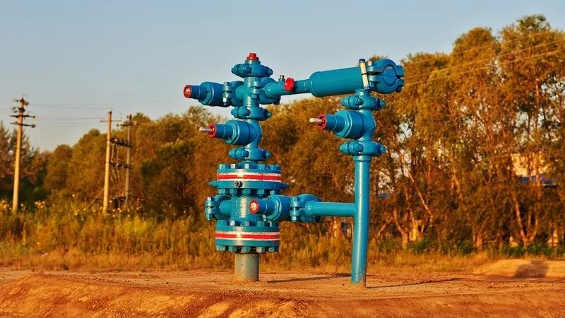 Blue injection well above ground