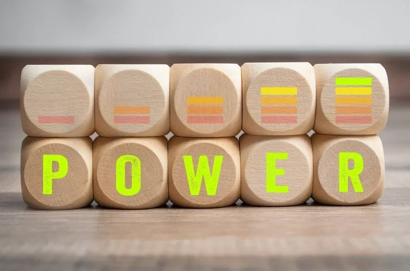 Wooden blocks that spell "Power"