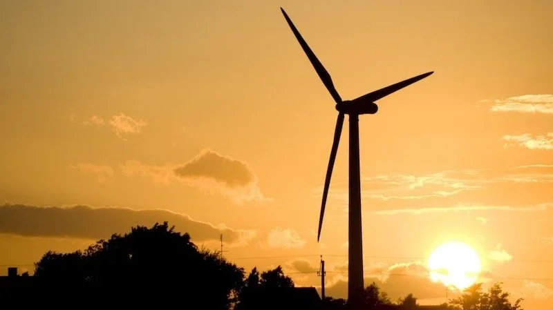 Windmill on an orange sky
